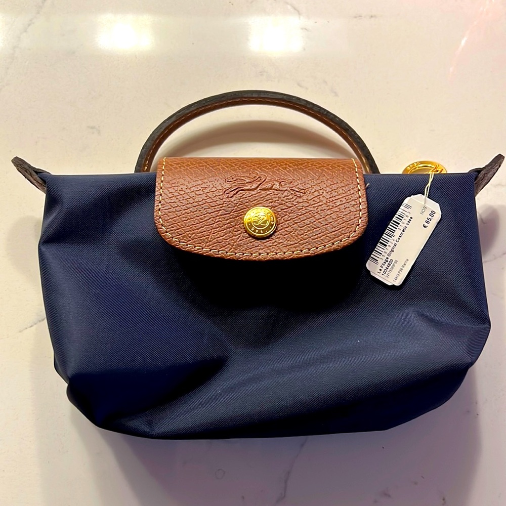 Original, brand new with tag cosmetic case Longchamp